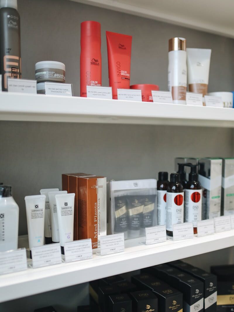 A variety of skincare and beauty products displayed neatly on store shelves.